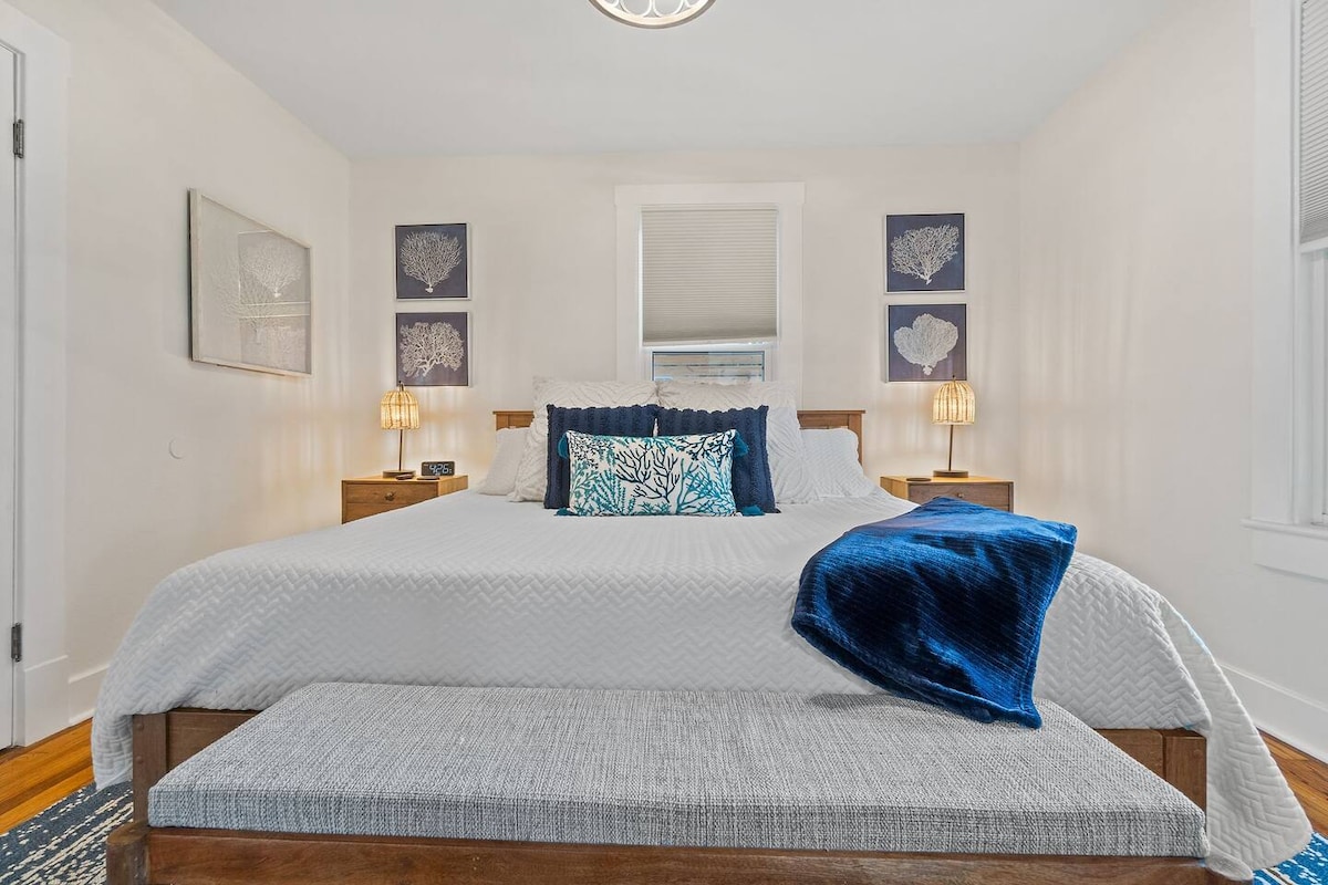 Peaceful master king bedroom with quality memory foam mattress ensures restful sleep after days at Pensacola Beach.