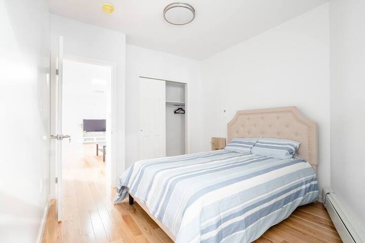 Second bedroom with closet and doorway through