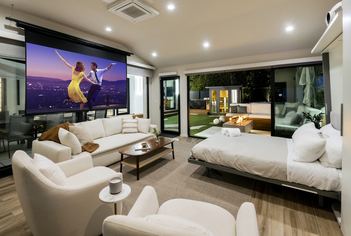 This spacious and well-designed suite includes a queen bed, sofa bed, and a built-in Murphy bed. Enjoy movie nights with the projector and screen—ideal for extra guests or family fun.