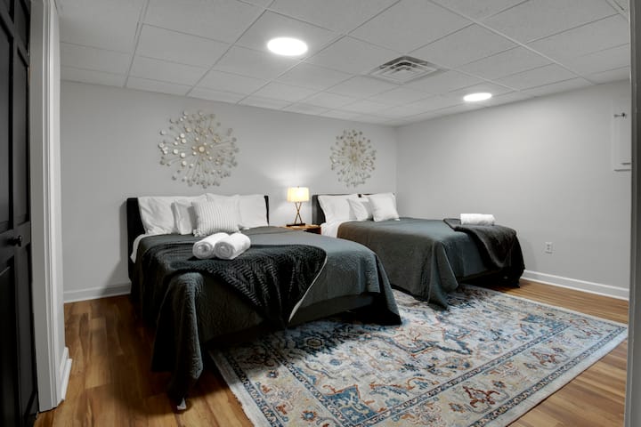 Basement bedroom with 2 Queen beds - 12" green tea memory foam with luxurious sheets.