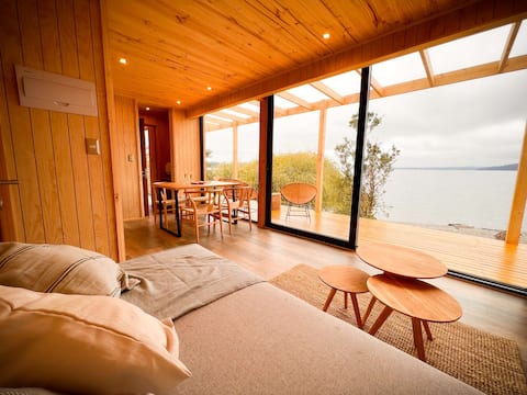 Family cabin on the shore of Puyehue beach/Outscape