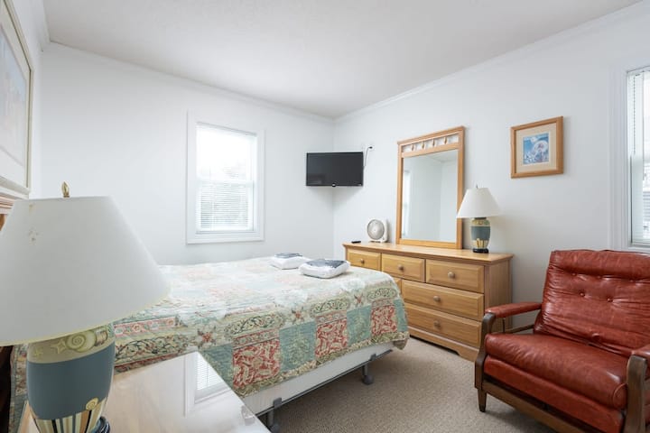 Acogedora habitación con cama tamaño queen y ambiente relajante