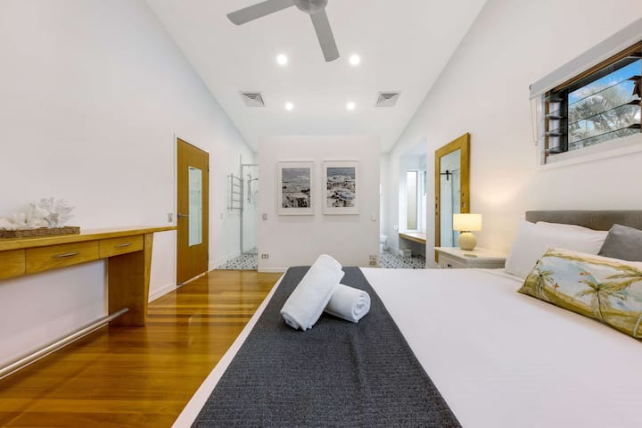 Enjoy this luxurious and spacious master suite with a King sized bed. 