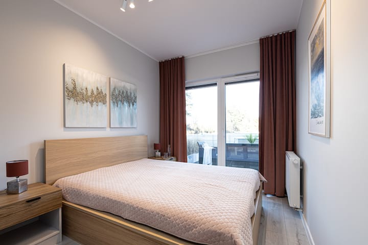 Легло в спалня на апартамент Мелия