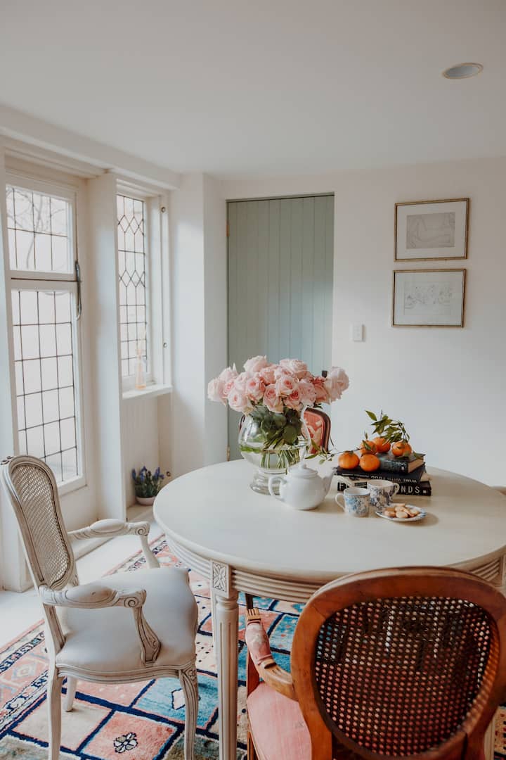 Living Areas_ Downstairs Casual Dining 
Enjoy the breathtaking view from our 4 seater small coffee table area.  