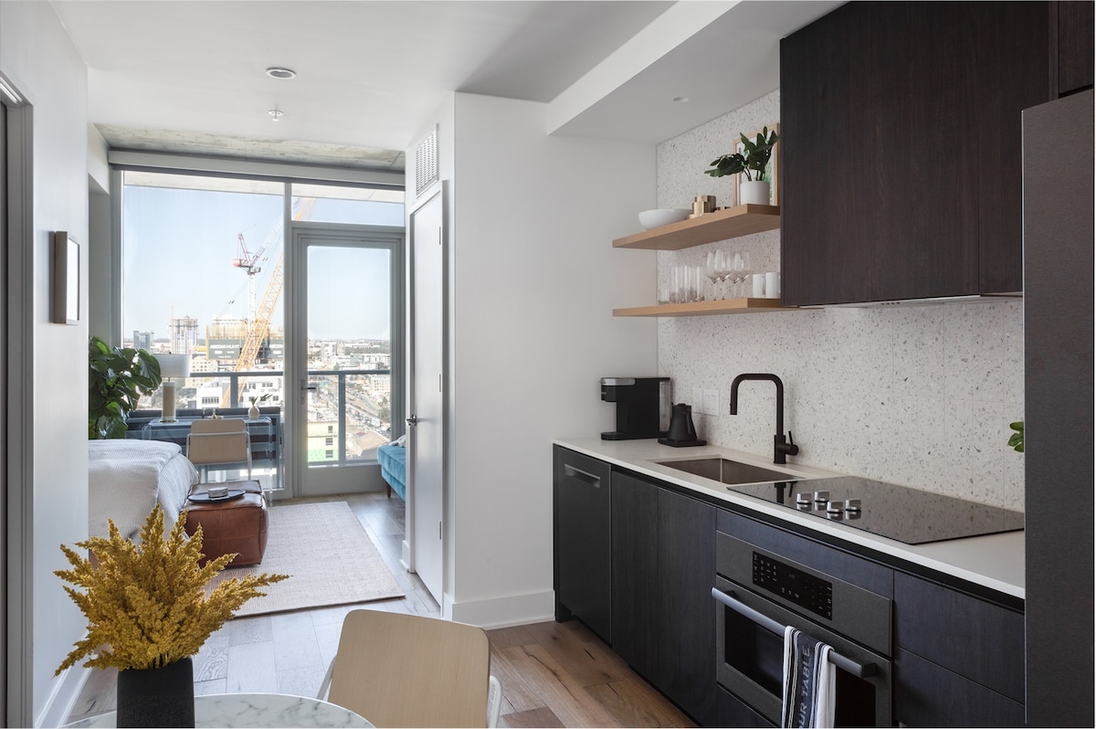 Heated Rooftop Pool | Free Parking! | Skyline View