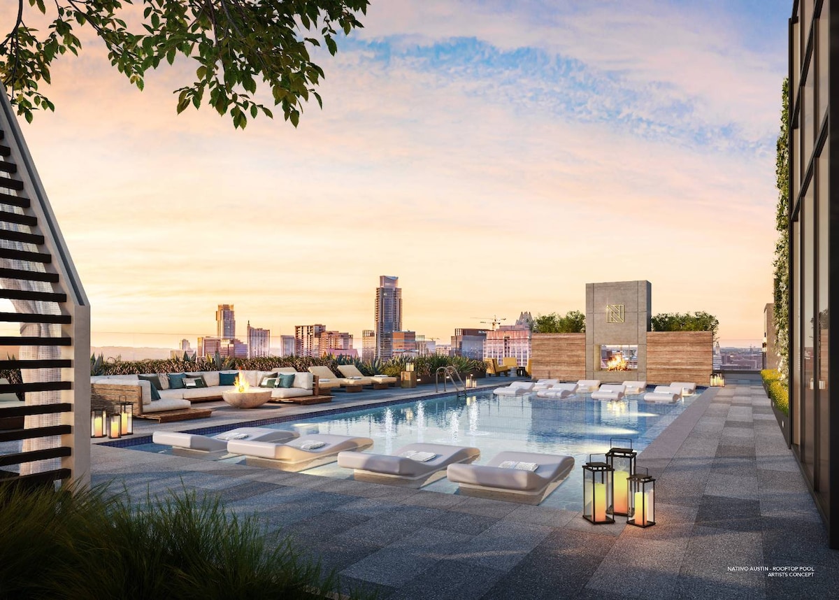 Heated Rooftop Pool | Free Parking! | Skyline View
