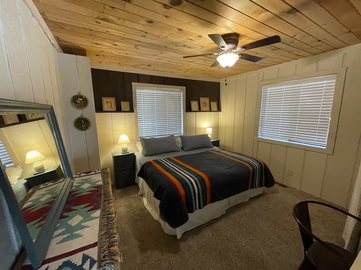 2nd bedroom downstairs has king bed, smart tv, air purifier, dedicated workspace (high speed internet included)