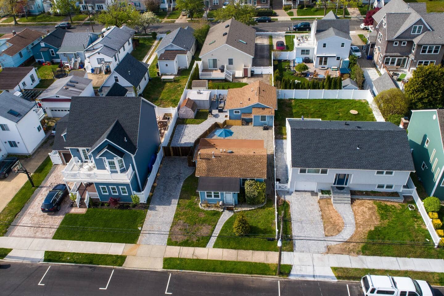Two Belmar houses on one property, nine beach badges included, room for the whole group.