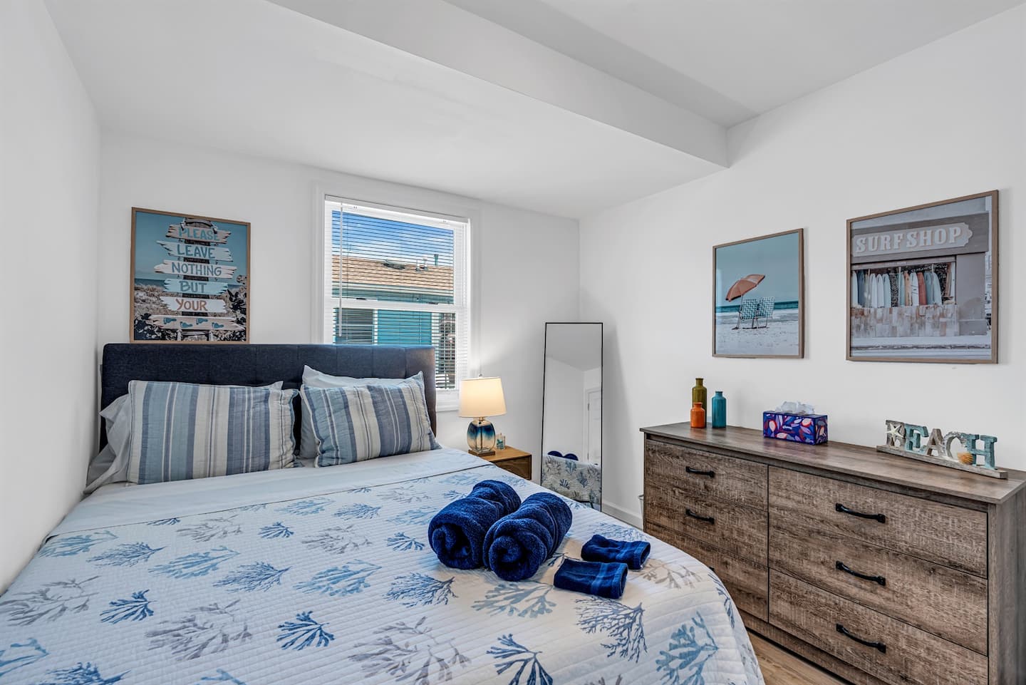 Unwind in coastal comfort in this bright, sun-filled bedroom retreat.