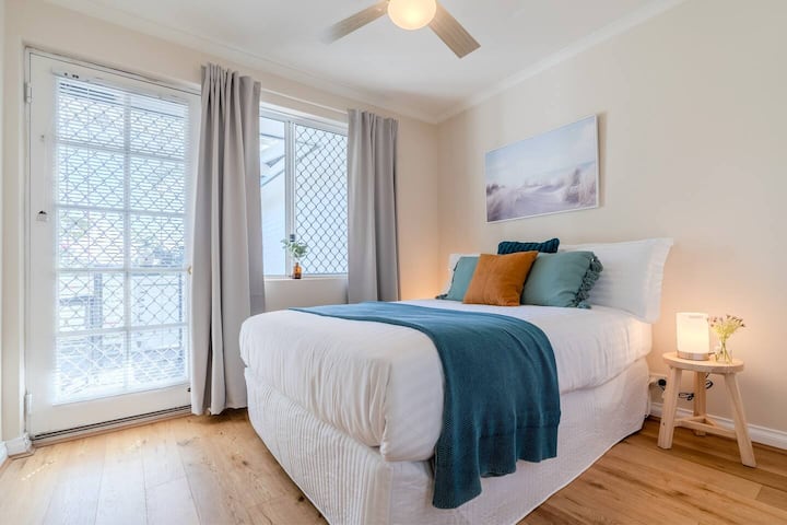 Start your day feeling refreshed in this bright, airy bedroom.