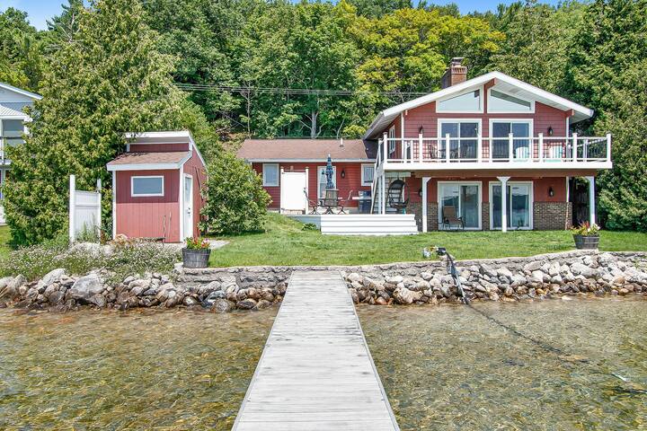 Spacious 4BR Lakefront Crystal Lake, MI | Dock