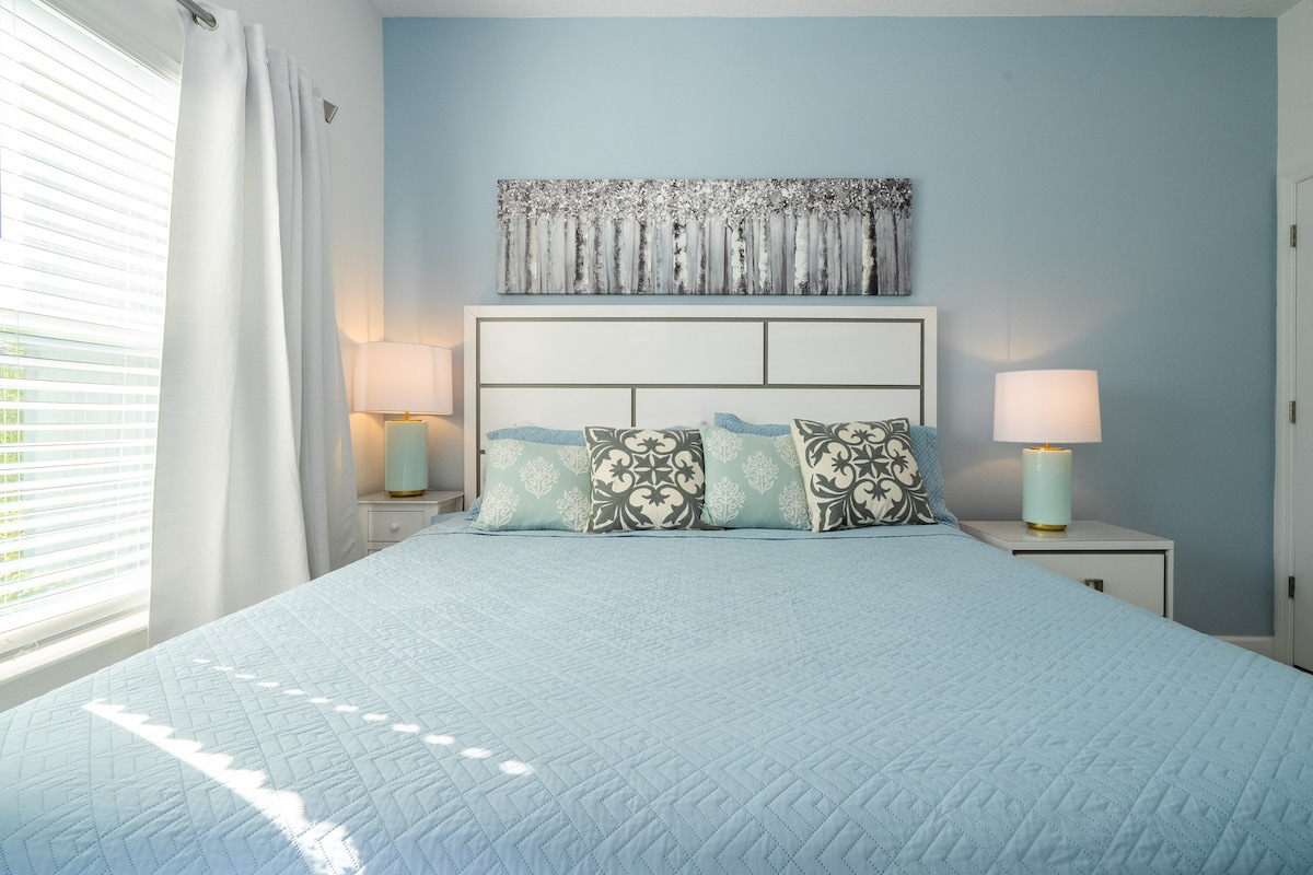 A spacious king-size bedroom conveniently located on the first floor