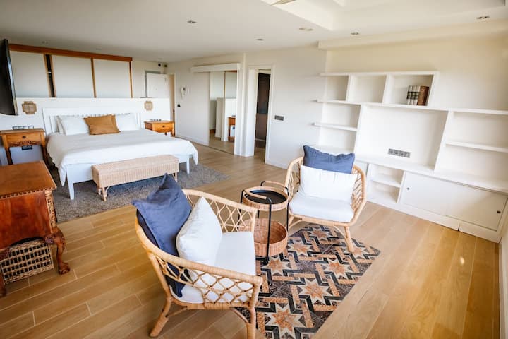 Separate bedroom with private bathroom
