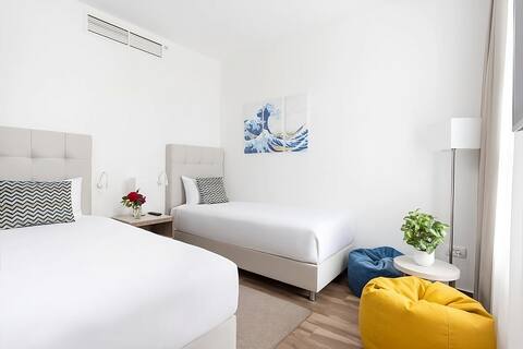 Beach Adventure! FOUR Modern 2BR Suites, Pools!