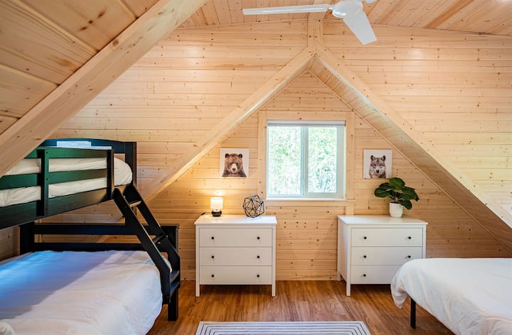 Loft area, with view of clothing storage and twin over double bunk bed