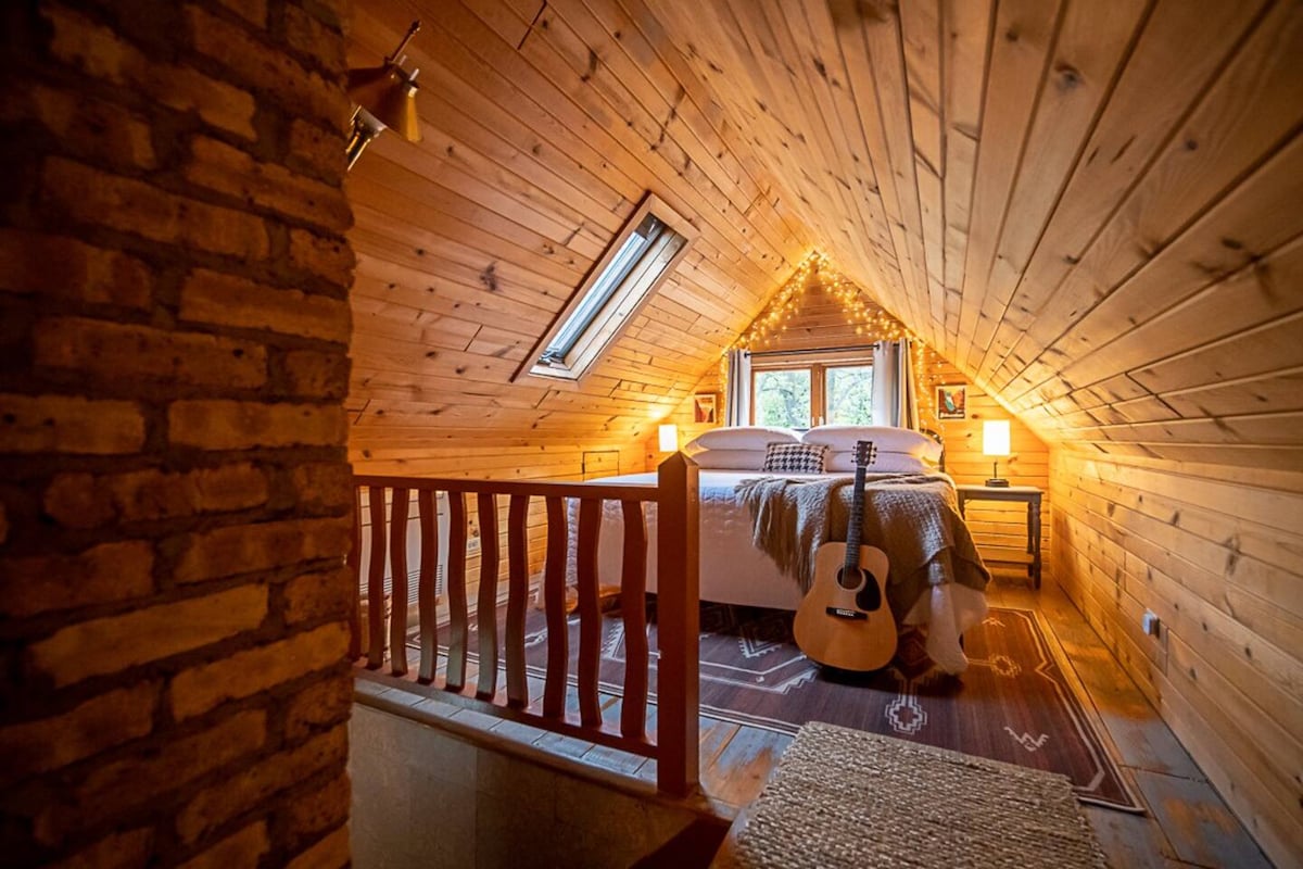 Absolutely cozy and romantic vibe, surrounded by soft lighting and warm woods!