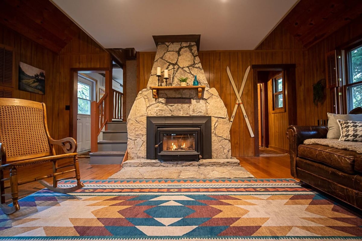 Relax on the leather sofa, leather recliner, or in the rocking chair, enjoying the wonderful smell of the wood burning fireplace on a cozy evening (wood provided).