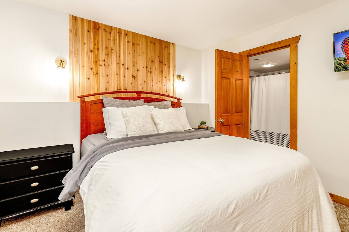 Downstairs primary bedroom with attached ensuite