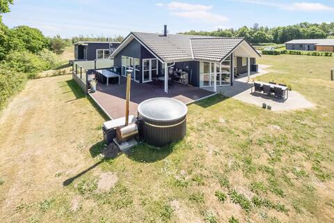 Family-friendly holiday home w. hot tub and sauna