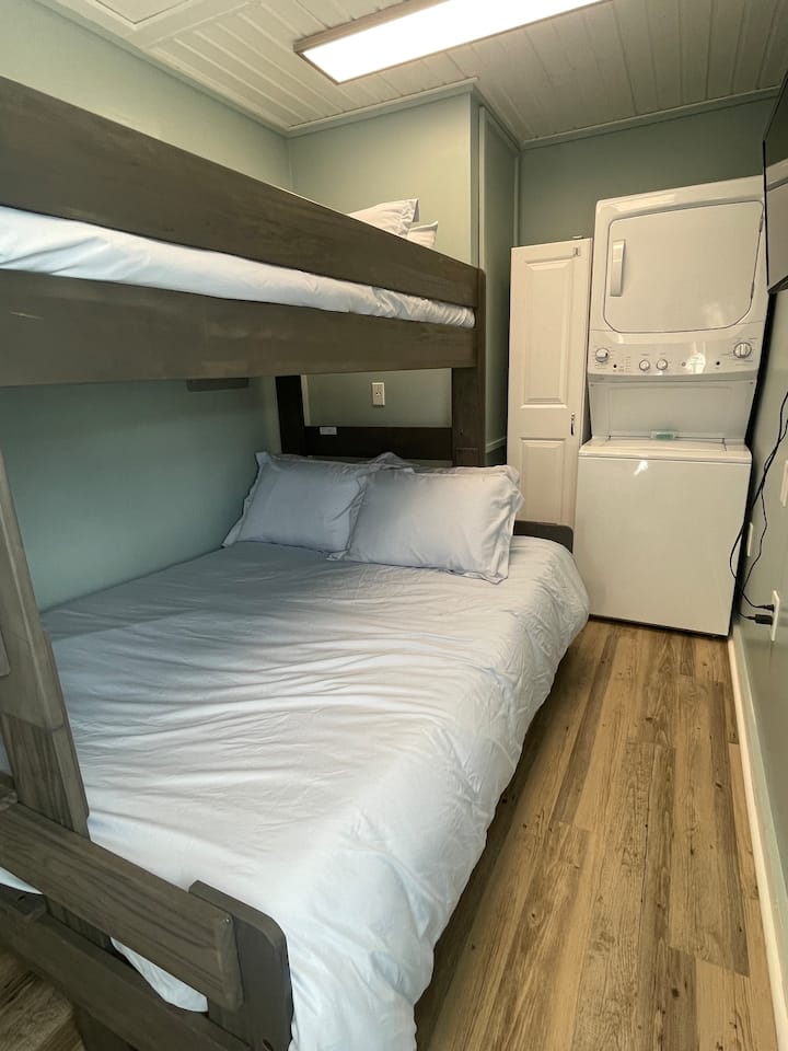 Bedroom 
Full size bed at the bottom 
Twin size bed at the top