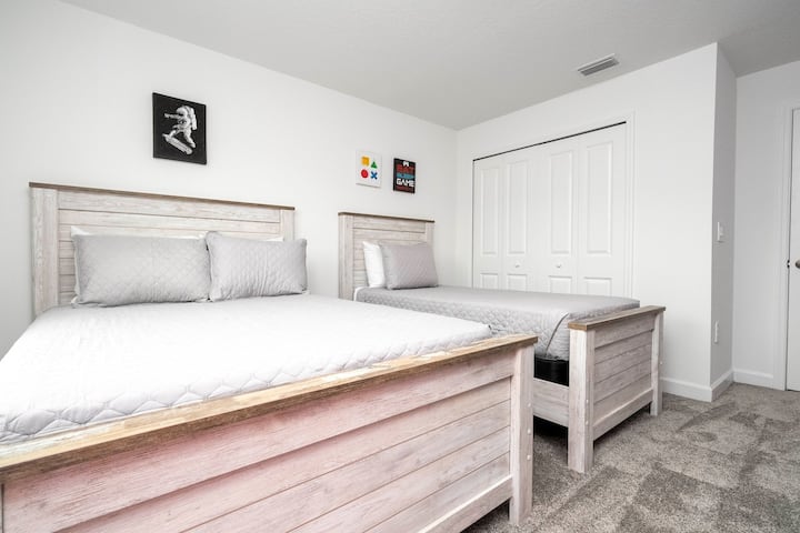 Bedroom 4. One single bed and One full size bed +  Smart Tv