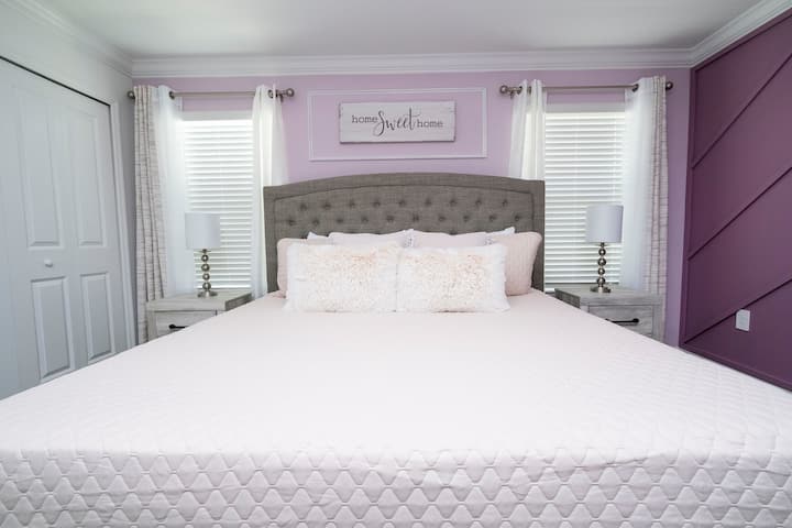 Bedroom 2: ONE King-size bed, Smart TV, and private bathroom (Master Bedroom)