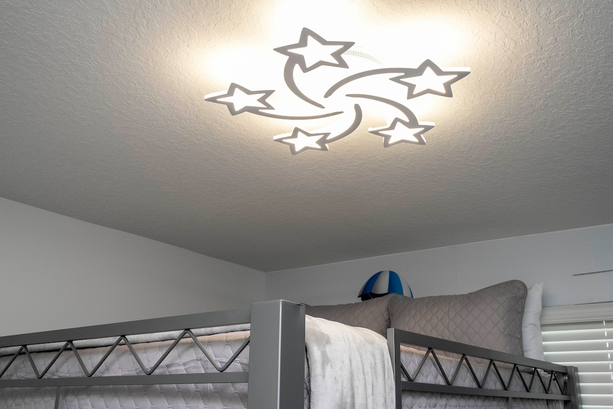 Bedroom 3: One Full-over-full bunk bed & Smart TV. Featuring a fun Super Mario Bros theme