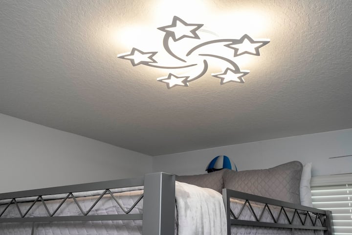 Bedroom 3: One Full-over-full bunk bed & Smart TV. Featuring a fun Super Mario Bros theme