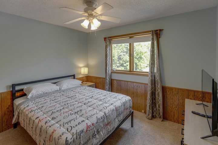 2nd bedroom with a queen and smart TV.