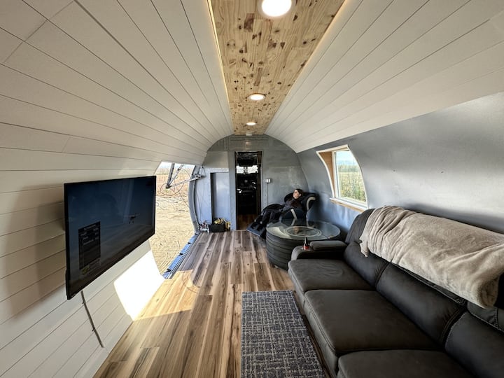 Sala de estar com sofá-cama