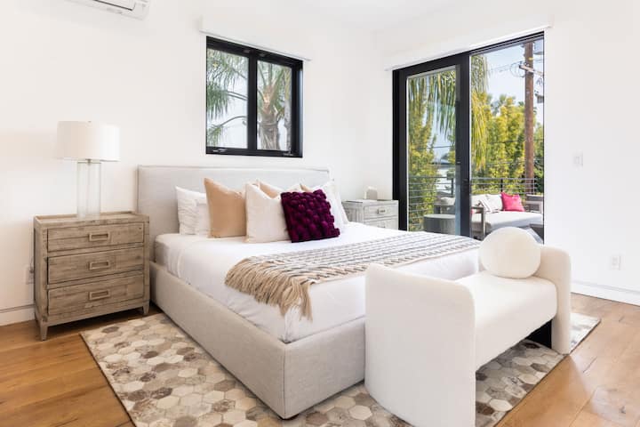 Enjoy a plush king bedroom upstairs - complete with an ensuite bathroom and patio access.