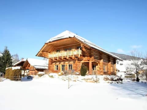 Beautiful wooden log house with sauna and garden