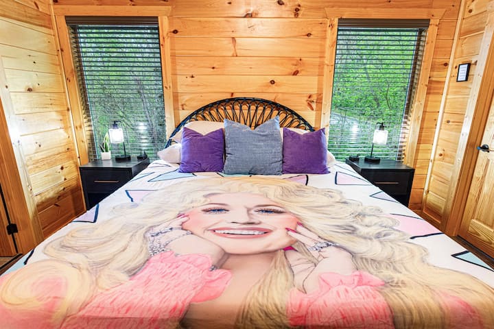 Bedroom 3 aka the Dolly Room (Upstairs) – King bed, private closet, shared bathroom with Bedroom 2. 50" Smart TV.