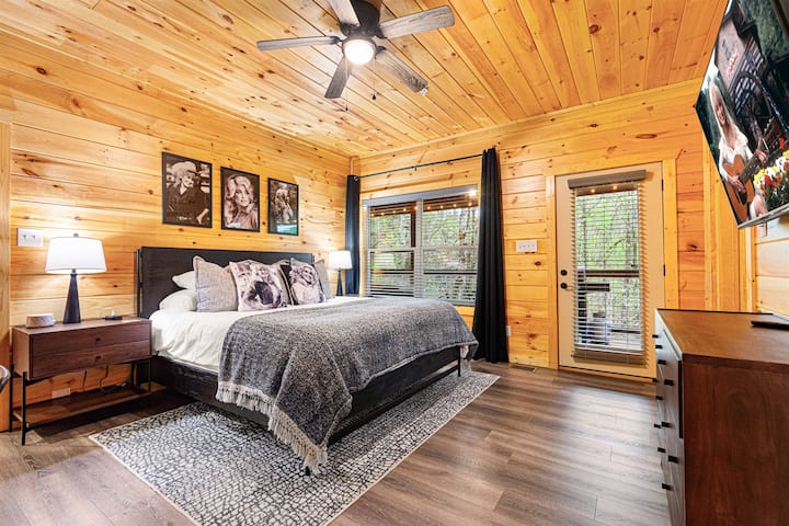 Master bedroom on main floor. Includes private closet, deck access, and bathroom