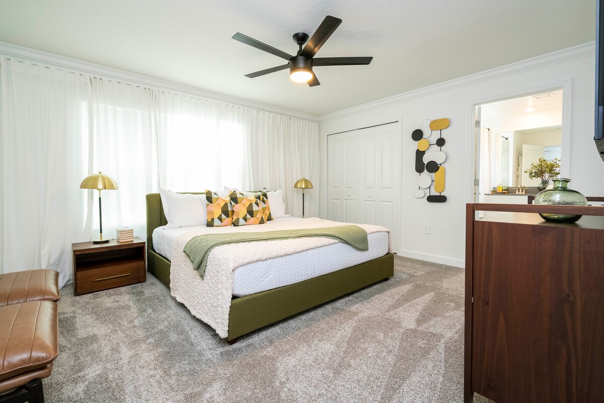 With a  Master bedroom with a king size bed