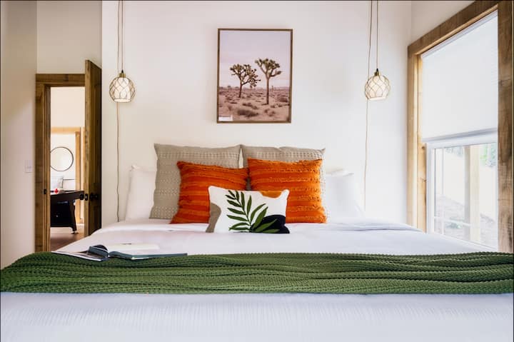 [Bedroom 3] Every detail is thoughtfully curated to bring comfort and elegance to our lower-level bedroom, complete with a king-sized bed.