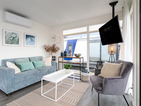 Modern houseboat with air conditioning in port