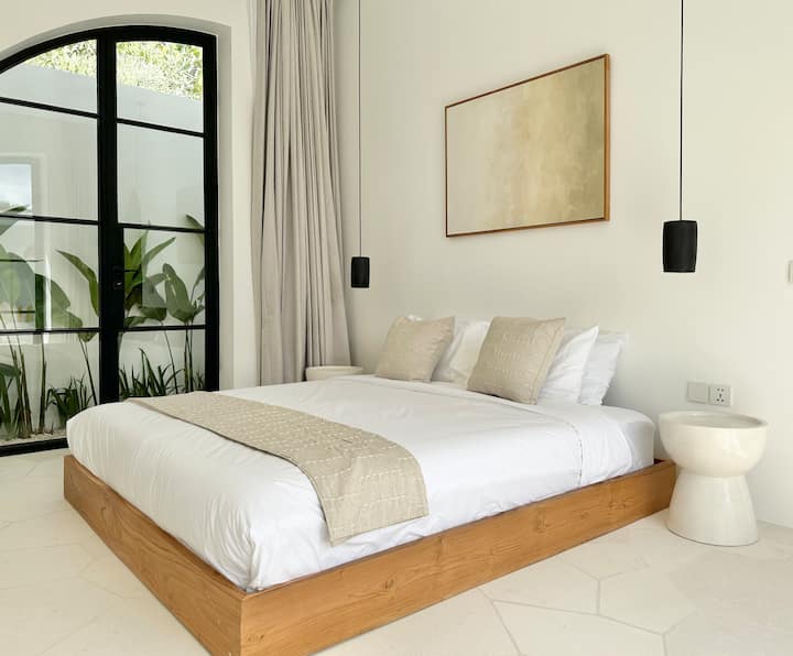 Every detail in the bedroom is designed for comfort from plush bedding to carefully selected finishes. A space that feels both inviting and refined.