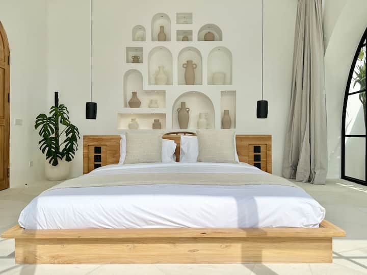 This bedroom is remain privacy and calm. Soft lighting, refined furnishings, and a harmonious layout create a deeply restful environment. The Kingsize bed, working area and wooden closet a space where design and relaxation meet in perfect balance.