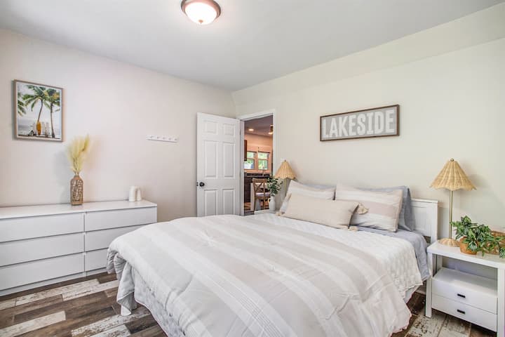Recharge in a queen bedroom, offering a serene space for rest & relaxation.