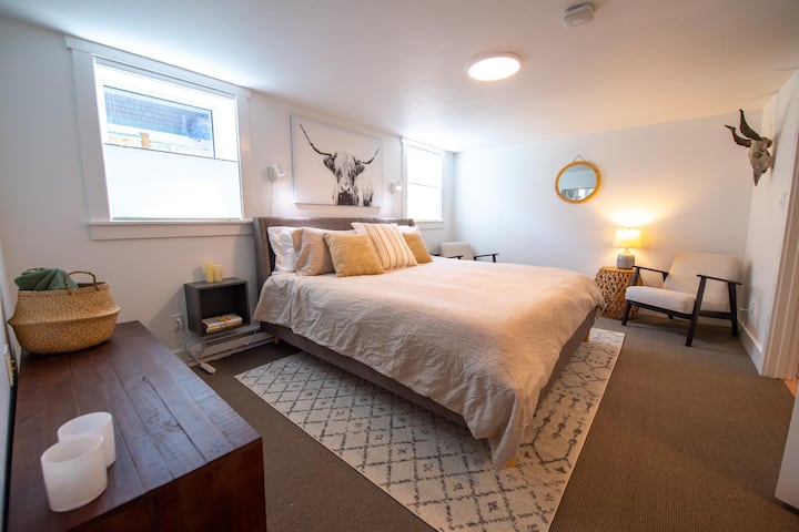 Master bedroom with king sized bed. 
