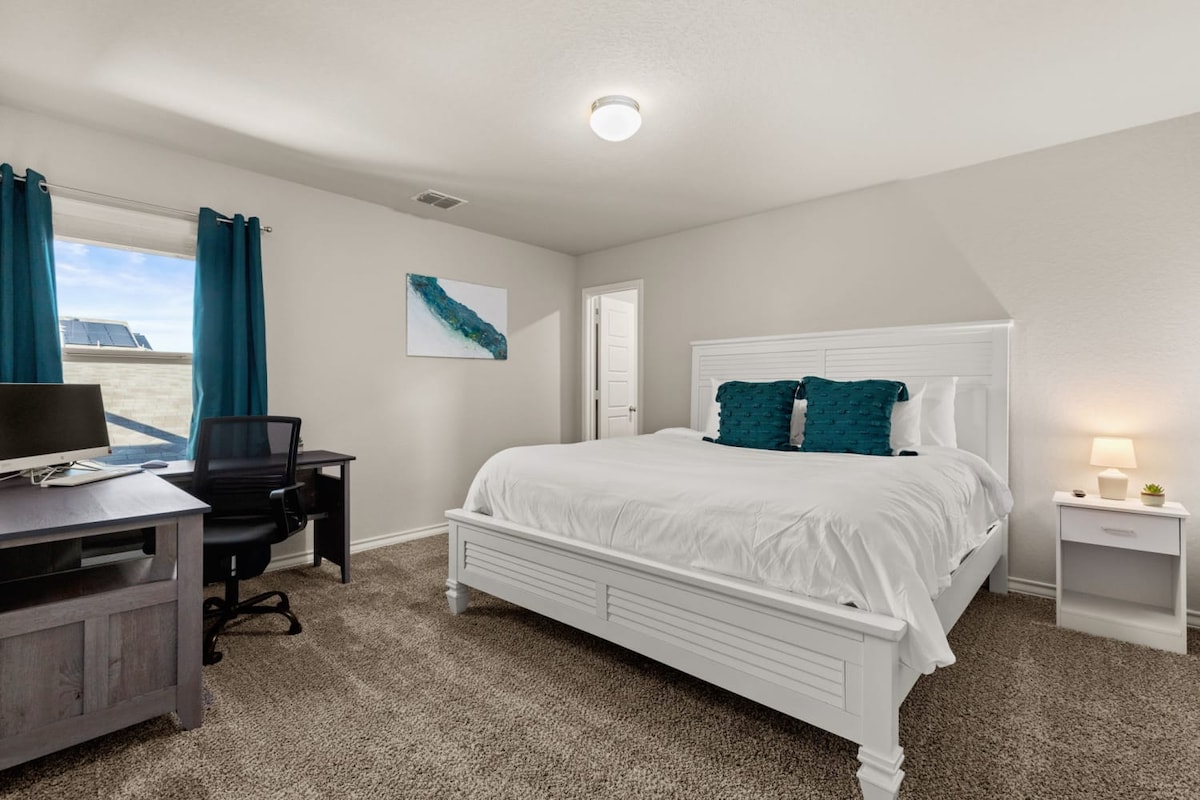 Bedroom 2: Second bedroom with queen-size bed.