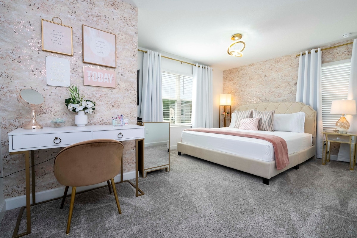 A beautiful bedroom with a  king sized bed 