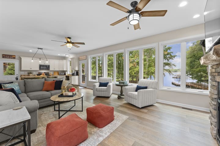 image 6 of 60, The wall to wall windows have lake views from each room.