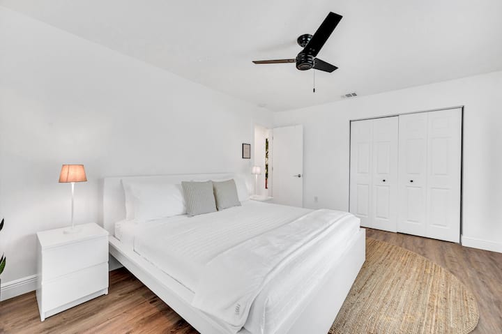 Unwind in Our Guests' Bedroom, Featuring a King-Size Bed and Smart TV.