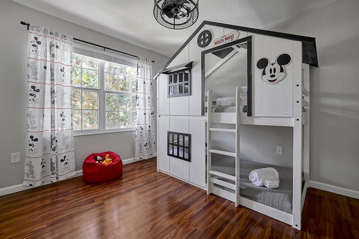 M-I-C-K-E-Y M-O-U-S-E! Welcome to the clubhouse! Kids will love this twin over twin bunkhouse! They can cuddle up in one of the beds or take a seat in the comfy bean bag to watch thier favorite show or read a book.