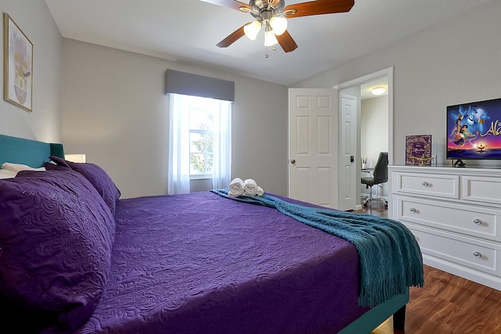 It's a whole new world in the Aladdin themed King suite. This room features a bold, beautiful bedframe and bright bedding, a brand new mattress, soft 100% cotton sheets, and a 40” Roku TV.