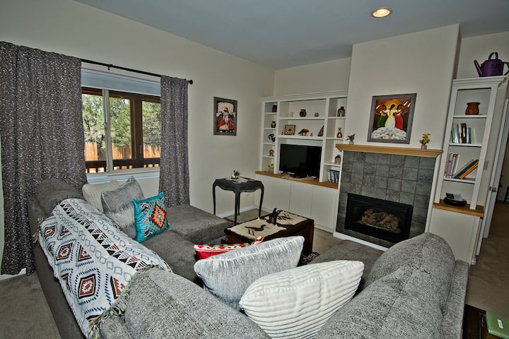 Cozy Living Area with Fireplace and TV