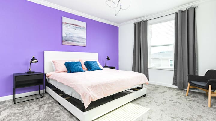 Experience luxury and comfort in our spacious bedroom, promising you a restful night's sleep.